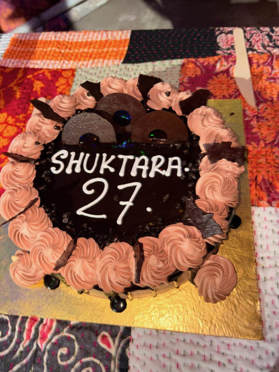cake with SHUKTARA 27 written with icing