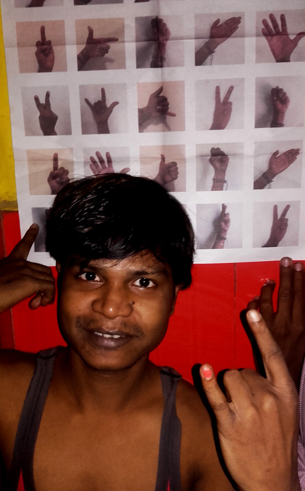 shuktara home for young adults with disability - 2016 October - Bapi with #BlackHands poster