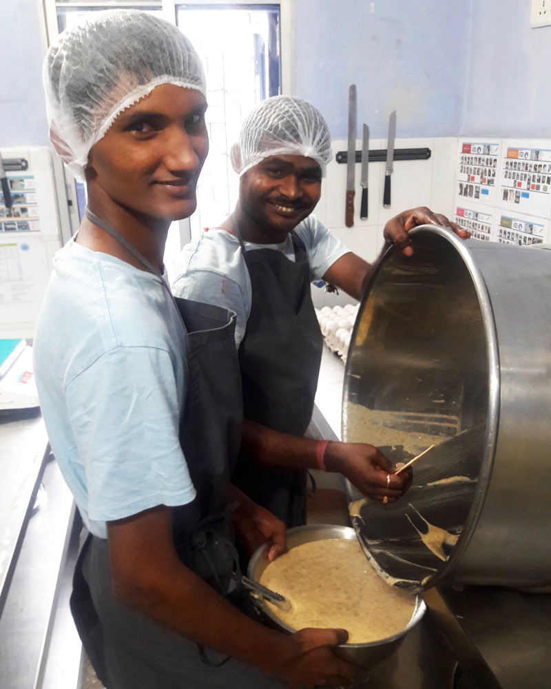 shuktara home for disabled boys - 2017 January - Pinku and Sanjay working hard at Shuktara Cakes