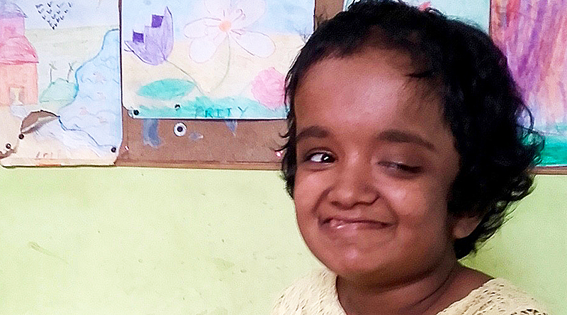 shuktara home for disabled girls - 2016 July - Moni stitching and smiling
